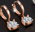 Bullhead Rose Gold Pink Moissanite Earrings